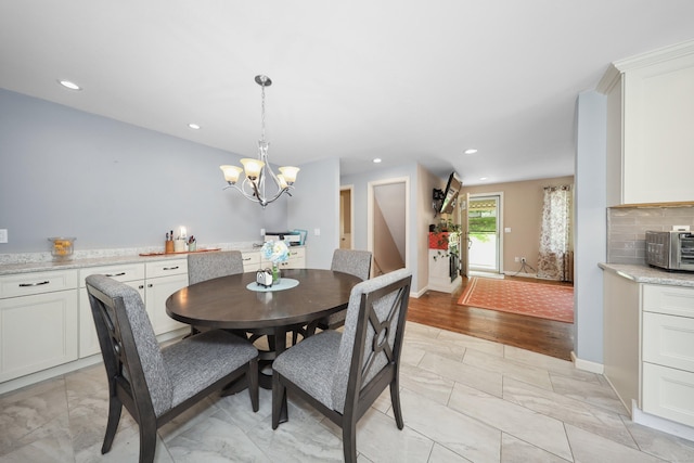 19 Benedict St, Plymouth, CT 06786 - dining area with light marble finish flooring, a chandelier, and recessed lighting