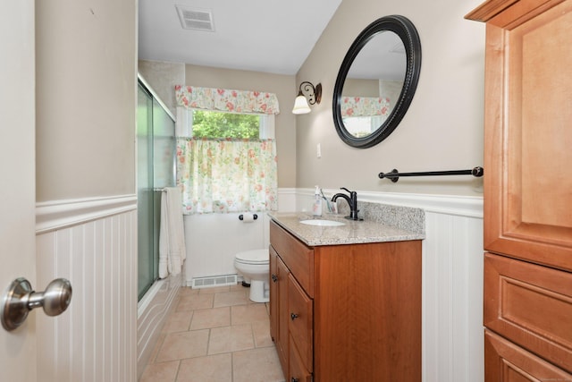 19 Benedict St, Plymouth, CT 06786 - full bathroom with a wainscoted wall, vanity, tile patterned flooring, bath / shower combo with glass door, and a decorative wall