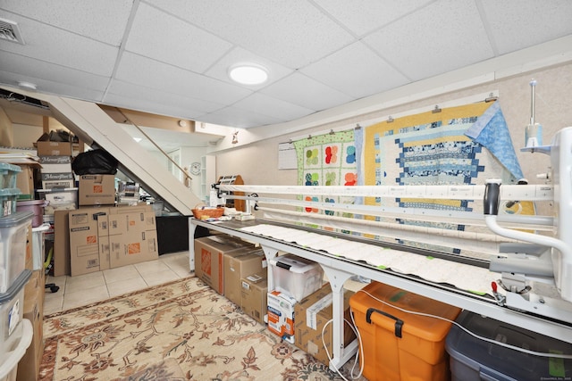 19 Benedict St, Plymouth, CT 06786 - finished basement featuring a drop ceiling, tile patterned floors, and stairs