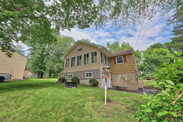 19 Benedict St, Plymouth, CT 06786 - back of house featuring a sunroom and a yard