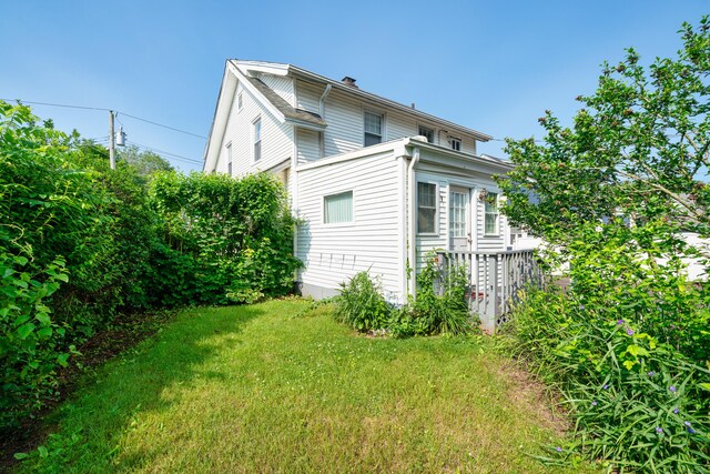 43 Quentin St, Hamden, CT 06517 - view of home's exterior with a yard and a chimney