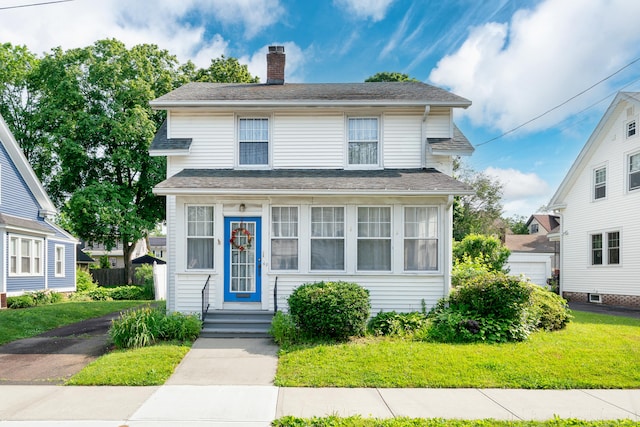 43 Quentin St, Hamden, CT 06517 - view of front of home with a chimney and a front yard