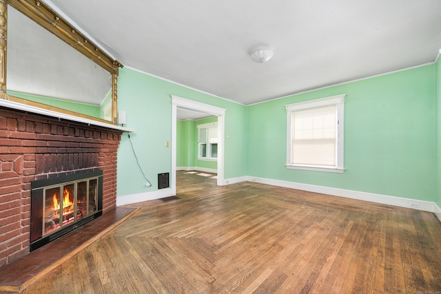 43 Quentin St, Hamden, CT 06517 - unfurnished living room with a brick fireplace and crown molding