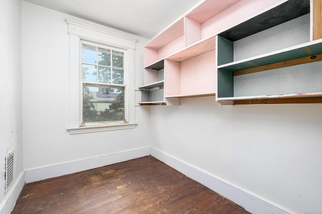 43 Quentin St, Hamden, CT 06517 - walk in closet with dark wood-style flooring