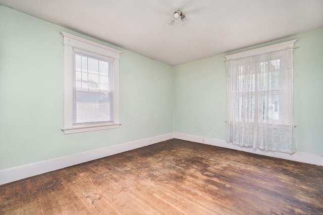 43 Quentin St, Hamden, CT 06517 - unfurnished room featuring dark wood-style floors and baseboards