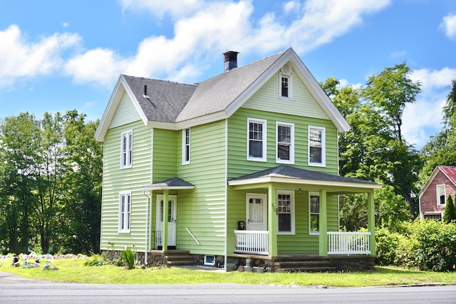 575 S Main St, Naugatuck, CT 06770 - traditional-style home featuring a chimney, a porch, and a shingled roof