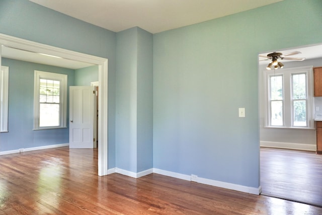 575 S Main St, Naugatuck, CT 06770 - empty room with wood finished floors and a ceiling fan