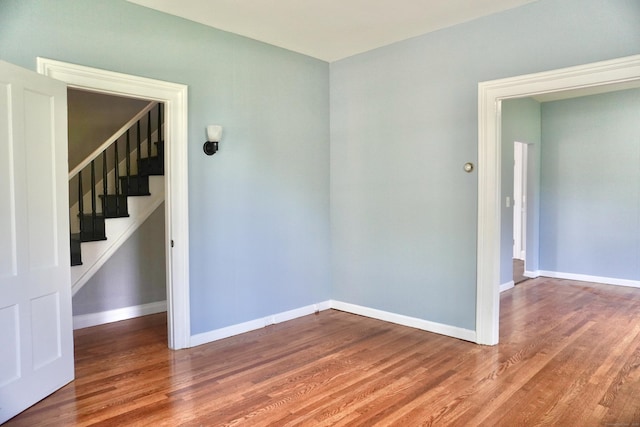 575 S Main St, Naugatuck, CT 06770 - unfurnished room featuring wood finished floors and stairway