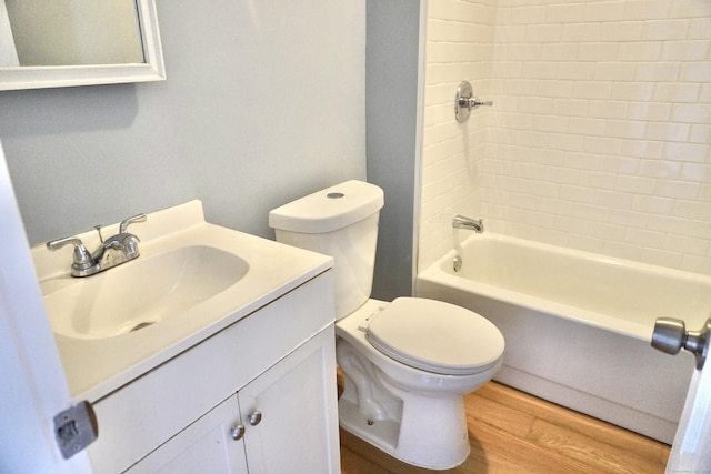 575 S Main St, Naugatuck, CT 06770 - full bathroom featuring wood finished floors, vanity, and bathtub / shower combination