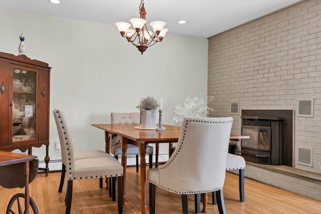 224 Neptune Dr, Groton, CT 06340 - dining area with a chandelier, light wood-type flooring, recessed lighting, and baseboard heating