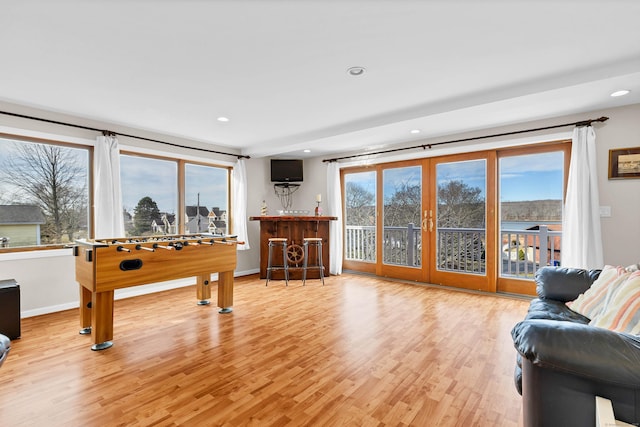 224 Neptune Dr, Groton, CT 06340 - living area with light wood-style floors, recessed lighting, baseboards, and french doors