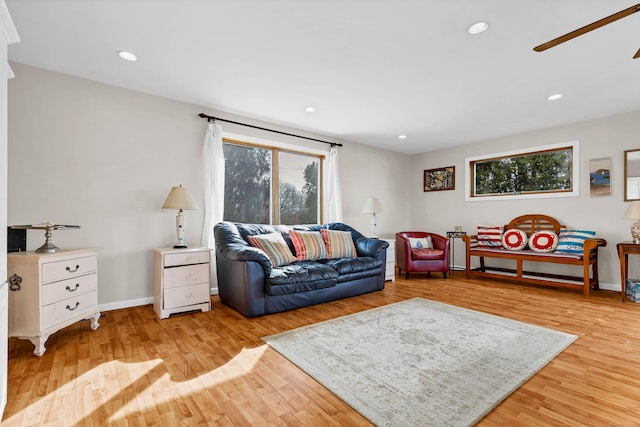 224 Neptune Dr, Groton, CT 06340 - living room with healthy amount of natural light, light wood finished floors, ceiling fan, recessed lighting, and baseboards