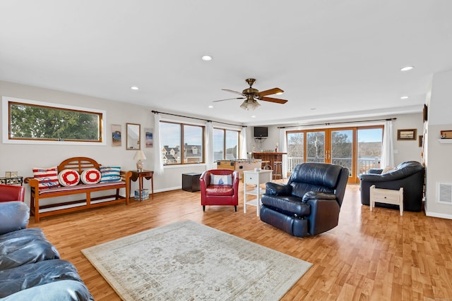 224 Neptune Dr, Groton, CT 06340 - living room with light wood-type flooring, a ceiling fan, recessed lighting, and baseboards