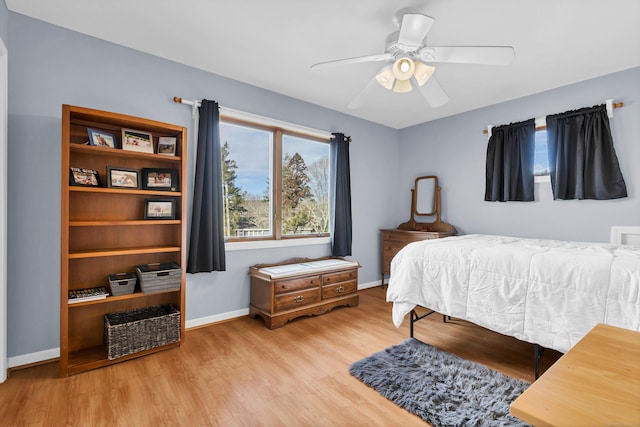224 Neptune Dr, Groton, CT 06340 - bedroom with wood finished floors, baseboards, and ceiling fan