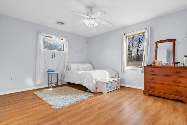 224 Neptune Dr, Groton, CT 06340 - bedroom featuring light wood-style flooring, multiple windows, and baseboards