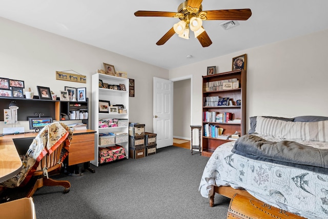 224 Neptune Dr, Groton, CT 06340 - bedroom with dark carpet, a desk, and a ceiling fan