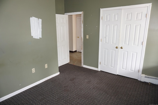 71 Martin St, Hartford, CT 06120 - unfurnished bedroom with carpet flooring, a closet, and a baseboard radiator