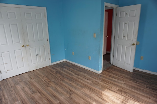 71 Martin St, Hartford, CT 06120 - unfurnished bedroom with a closet and wood finished floors