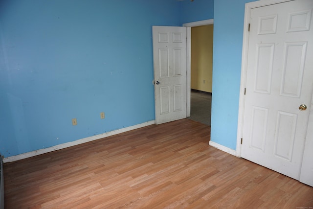 71 Martin St, Hartford, CT 06120 - unfurnished bedroom featuring light wood-style floors and baseboards