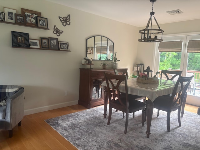 15 Great Meadow Rd, Danbury, CT 06811 - dining area with wood finished floors and baseboards