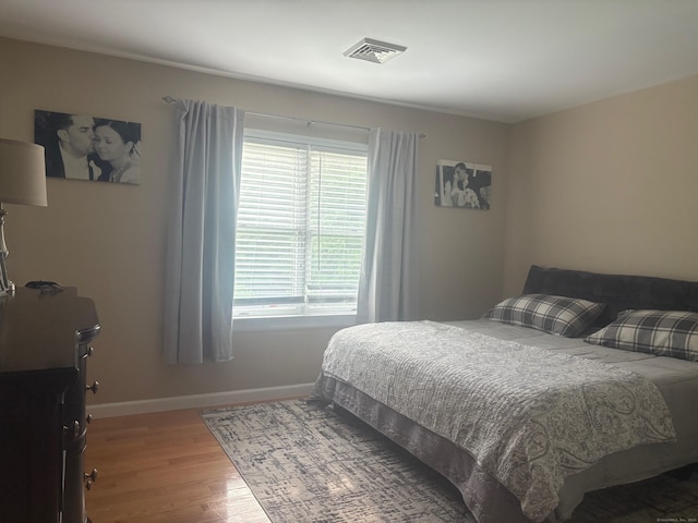 15 Great Meadow Rd, Danbury, CT 06811 - bedroom featuring baseboards and wood finished floors