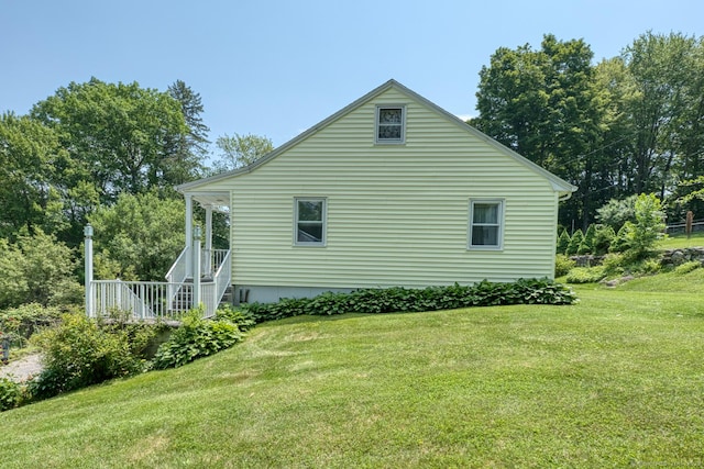 135 Jackson St, Torrington, CT 06790 - view of property exterior with a yard