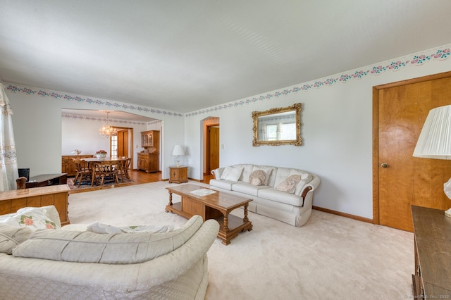 135 Jackson St, Torrington, CT 06790 - living area featuring a chandelier and carpet flooring