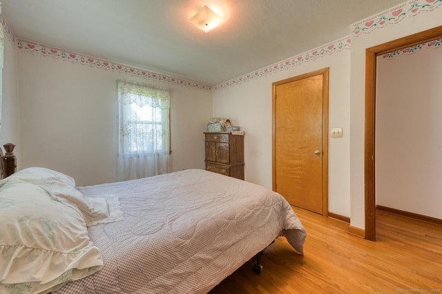 135 Jackson St, Torrington, CT 06790 - bedroom with light wood-type flooring and baseboards