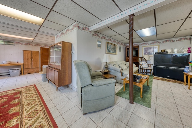 135 Jackson St, Torrington, CT 06790 - living room with a paneled ceiling and light tile patterned floors