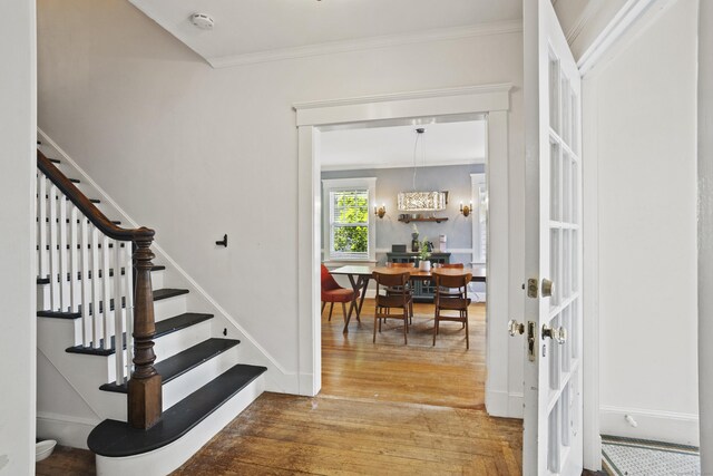 30 Cleveland Rd, New Haven, CT 06515 - foyer entrance with stairway, wood finished floors, and ornamental molding