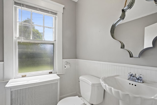 30 Cleveland Rd, New Haven, CT 06515 - half bath with a sink and wainscoting