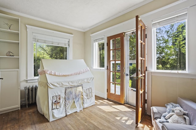 30 Cleveland Rd, New Haven, CT 06515 - doorway featuring hardwood / wood-style floors, ornamental molding, and plenty of natural light