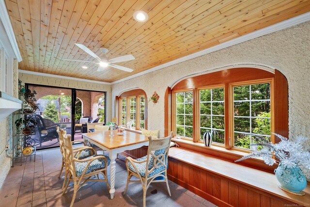 20 Arnoldale Rd, West Hartford, CT 06119 - dining space featuring ornamental molding, healthy amount of natural light, arched walkways, wood ceiling, and a ceiling fan