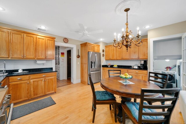 20 Arnoldale Rd, West Hartford, CT 06119 - kitchen featuring stainless steel appliances, decorative backsplash, light wood-style flooring, dark countertops, and recessed lighting