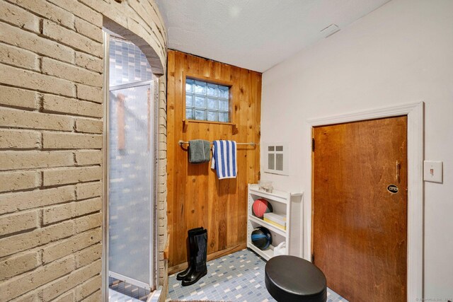 20 Arnoldale Rd, West Hartford, CT 06119 - entrance foyer featuring wood walls and baseboards