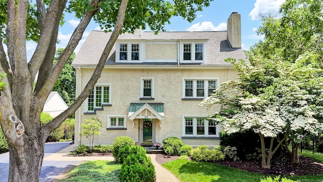 20 Arnoldale Rd, West Hartford, CT 06119 - view of front facade featuring stucco siding and a chimney