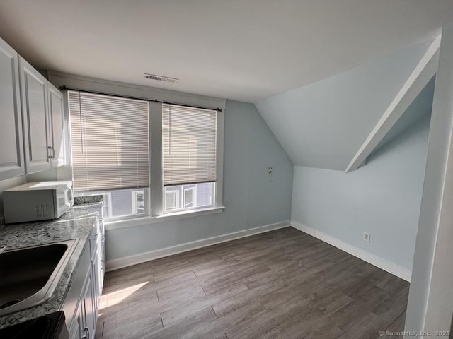 87 Blake St, New Haven, CT 06511 - laundry area with wood finished floors and a sink