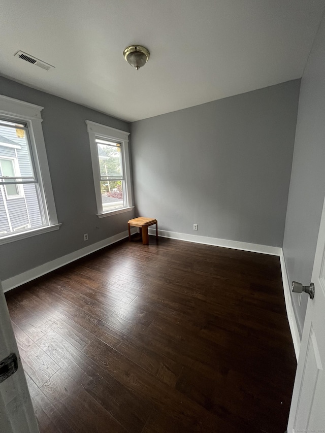 87 Blake St, New Haven, CT 06511 - spare room featuring dark wood finished floors and baseboards