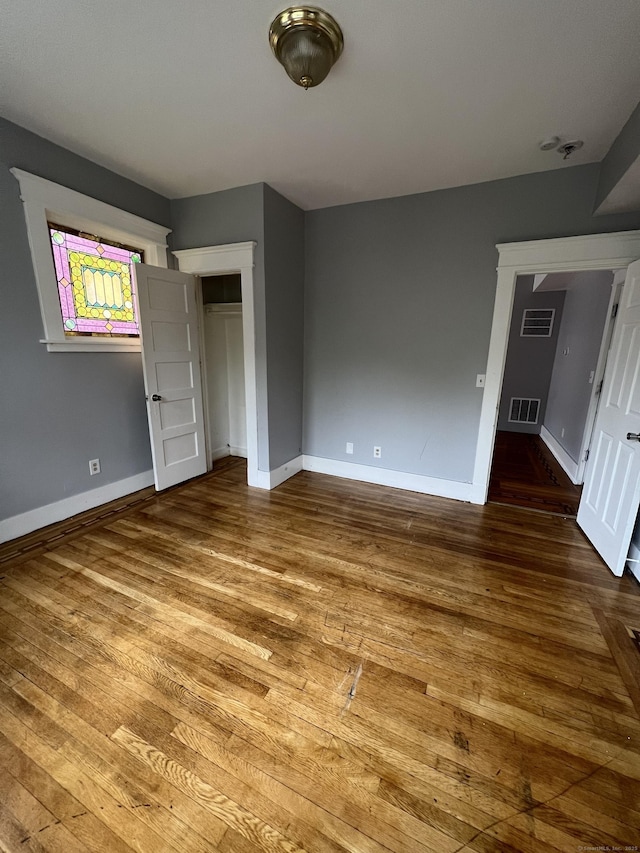 87 Blake St, New Haven, CT 06511 - unfurnished bedroom with wood finished floors and baseboards