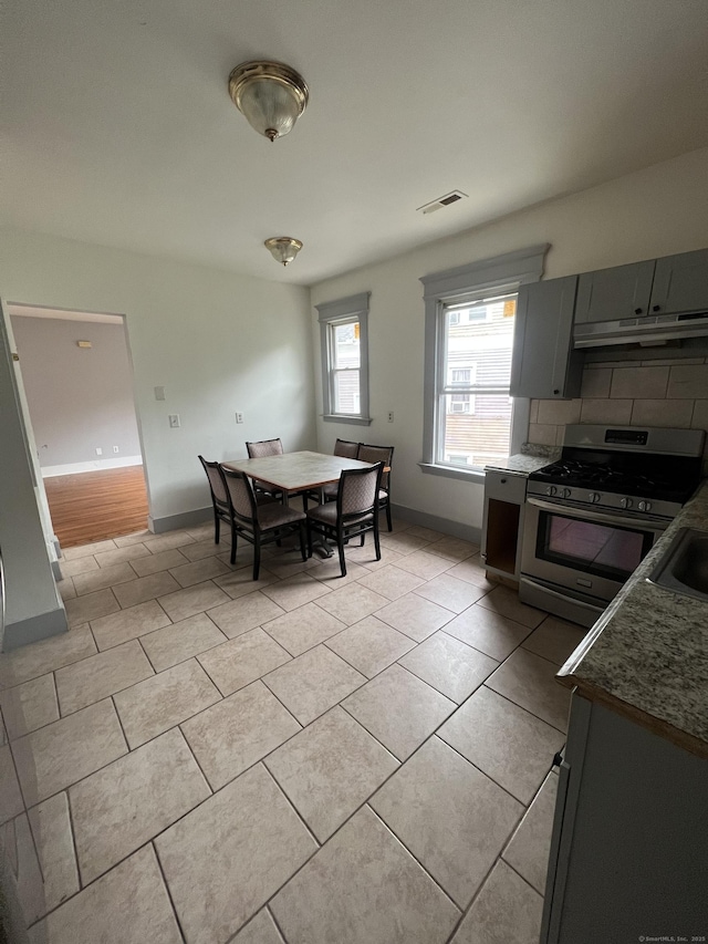 87 Blake St, New Haven, CT 06511 - dining area with light tile patterned flooring