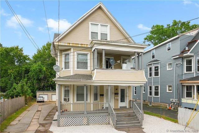 87 Blake St, New Haven, CT 06511 - view of front of property with covered porch, a balcony, and an outdoor structure