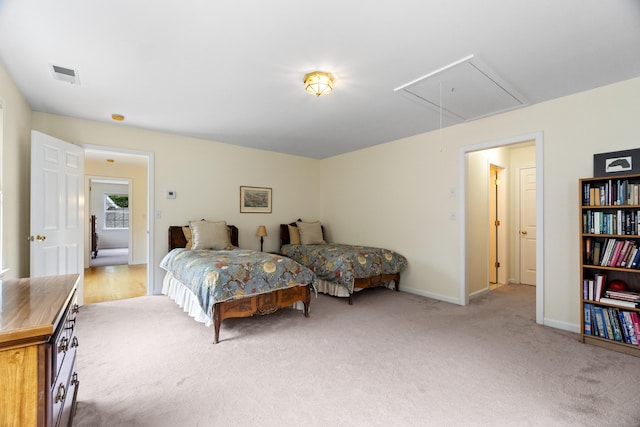 102 Leetes Island Rd, Guilford, CT 06437 - carpeted bedroom featuring attic access and baseboards
