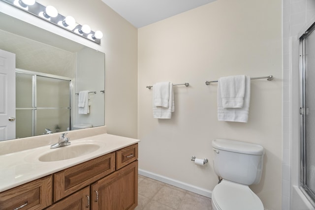 102 Leetes Island Rd, Guilford, CT 06437 - full bath featuring toilet, a shower with shower door, vanity, baseboards, and tile patterned floors