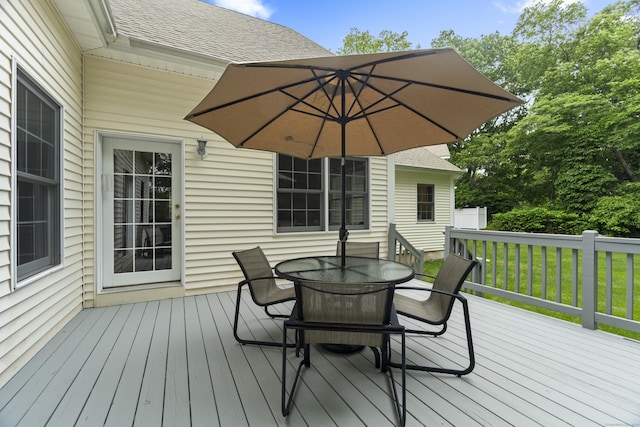 102 Leetes Island Rd, Guilford, CT 06437 - wooden deck featuring outdoor dining area