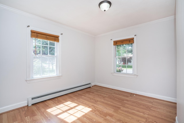 159 Cambridge Dr, East Hartford, CT 06118 - unfurnished room with baseboard heating, light wood finished floors, crown molding, and baseboards