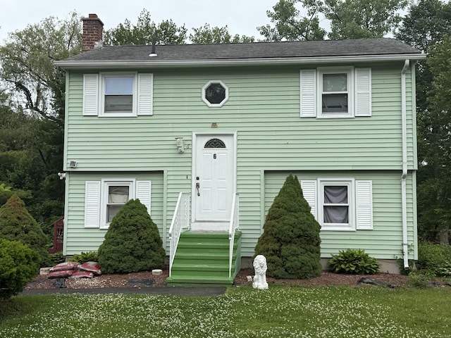 6 Sandra Dr, Bloomfield, CT 06002 - raised ranch featuring a chimney and a front lawn