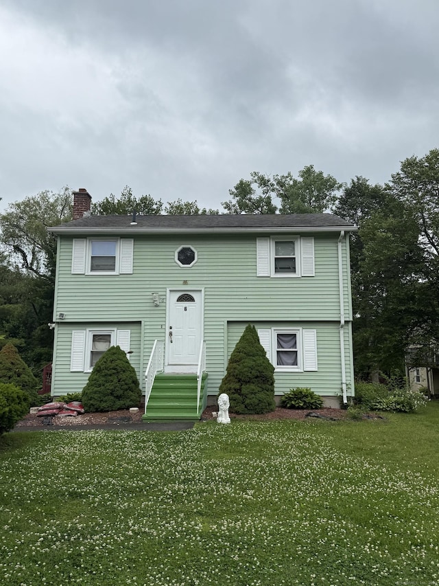 6 Sandra Dr, Bloomfield, CT 06002 - raised ranch with a chimney and a front lawn