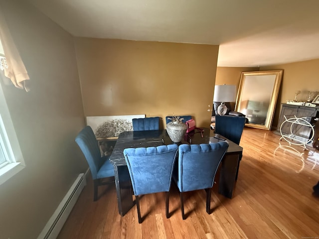 6 Sandra Dr, Bloomfield, CT 06002 - dining room featuring wood finished floors and baseboard heating