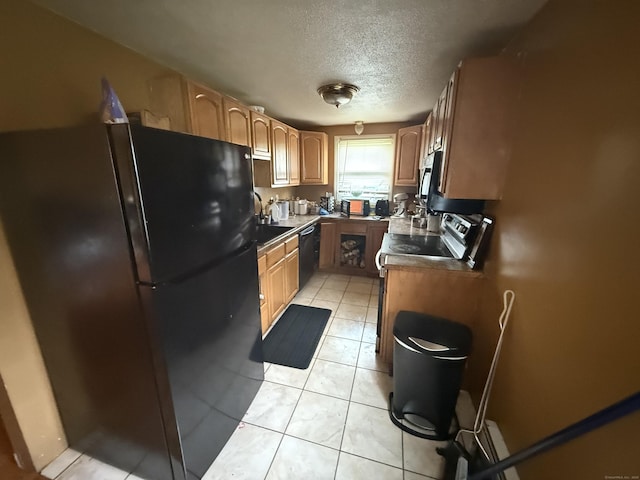6 Sandra Dr, Bloomfield, CT 06002 - kitchen featuring black appliances, a textured ceiling, light tile patterned floors, and dark countertops