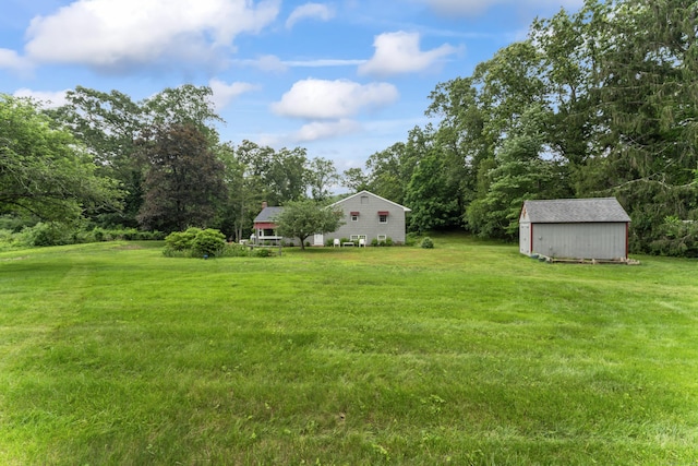 128 Walnut Tree Hill Rd, Newtown, CT 06482 - view of grassy yard featuring a shed